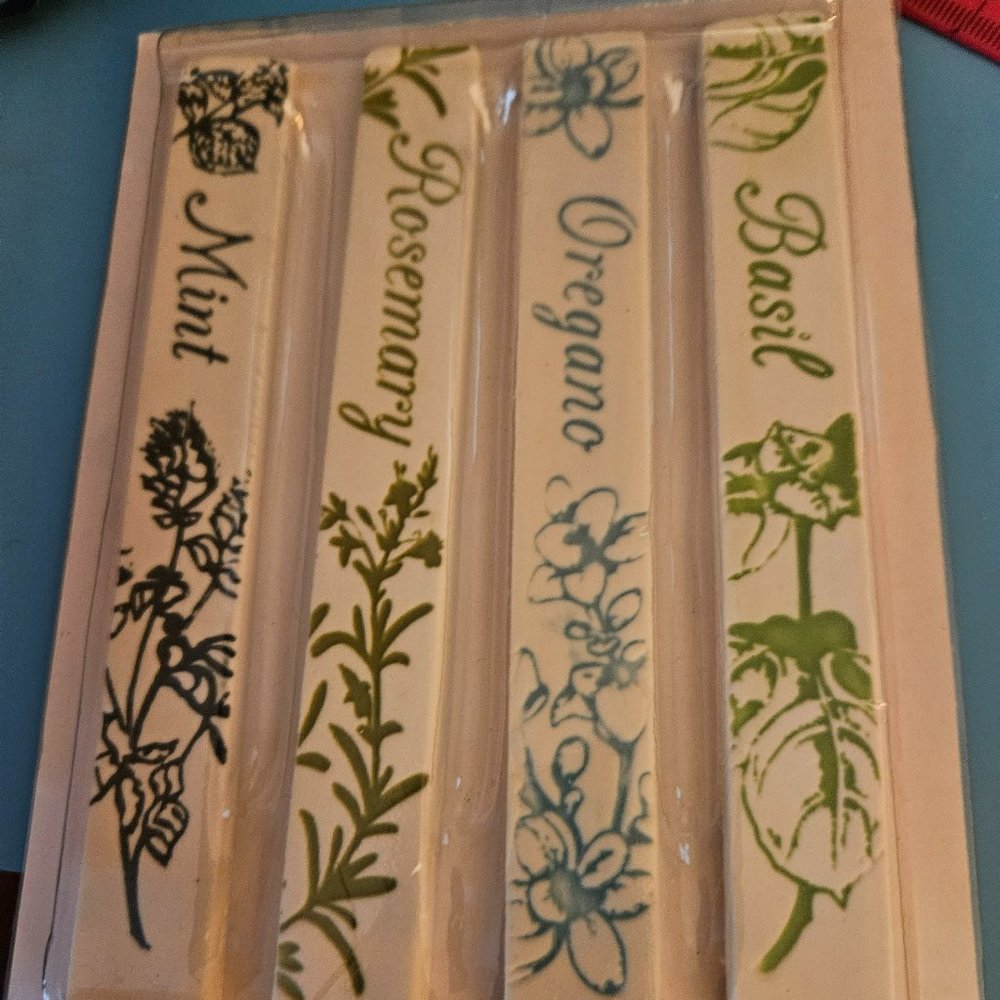 Four ceramic herb stakes oregano ,mint,basil&rosemary